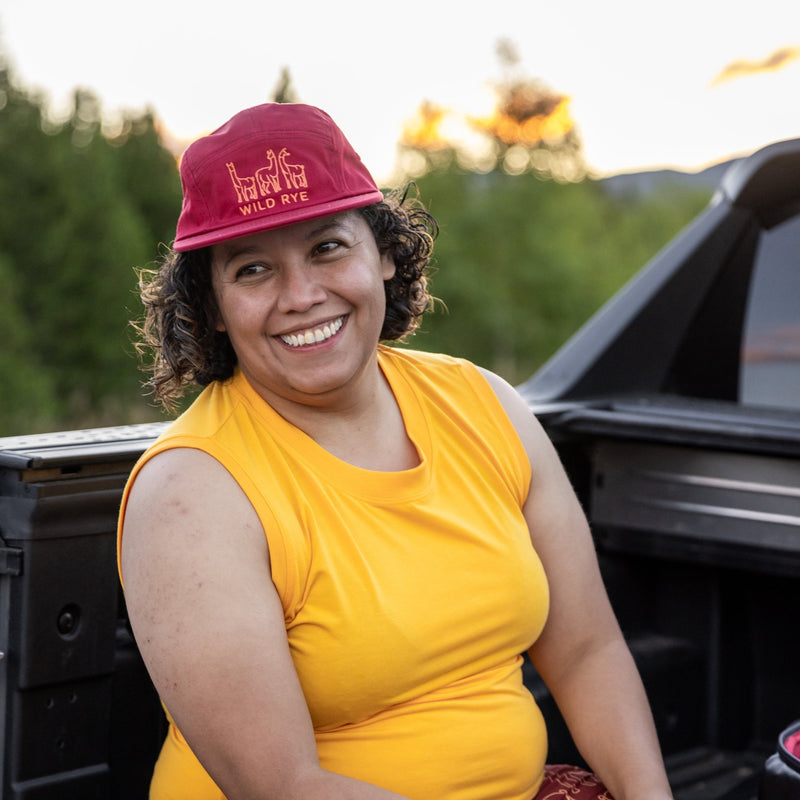 Woman smiling in back of truck