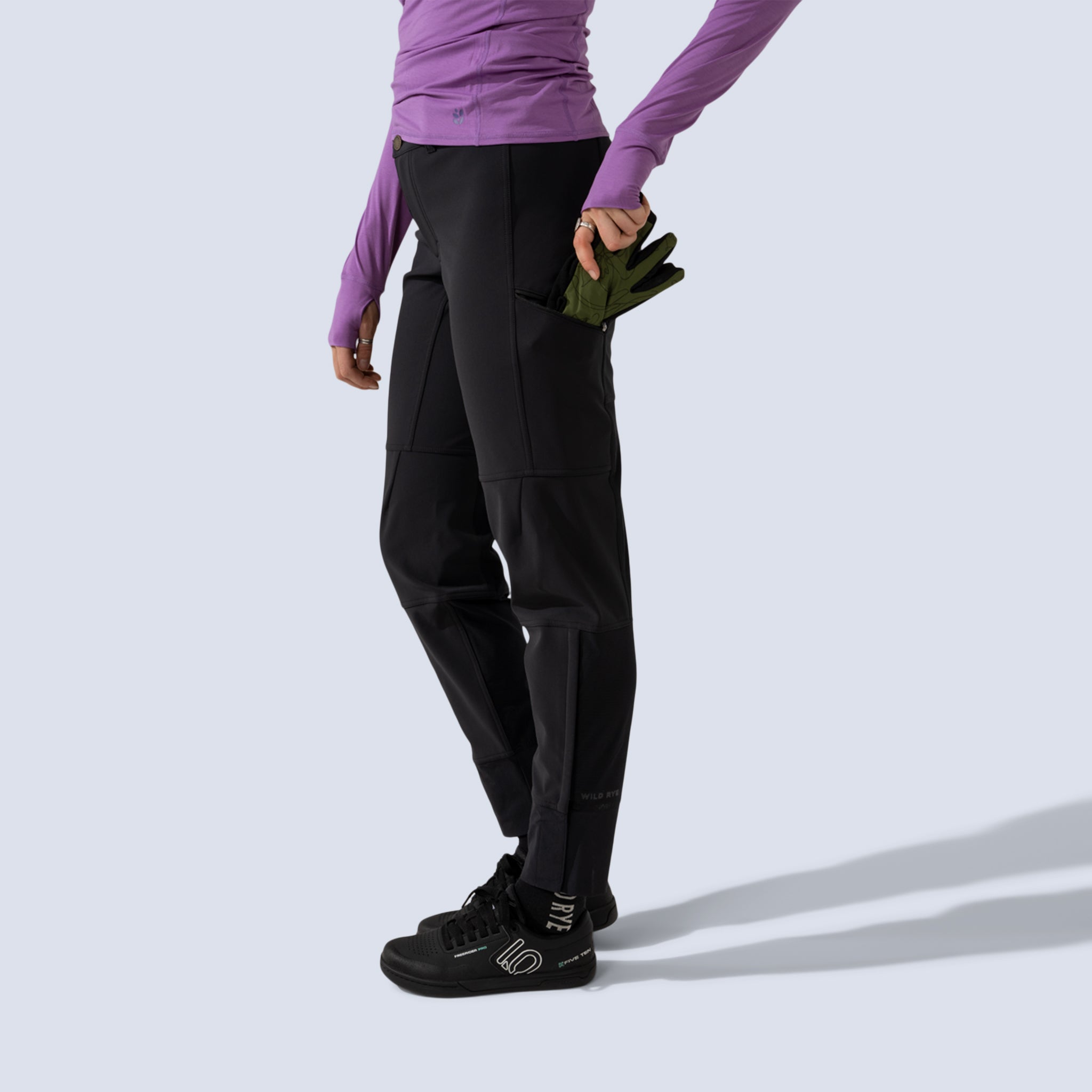 Black softshell freyah pant, model side pocket detail