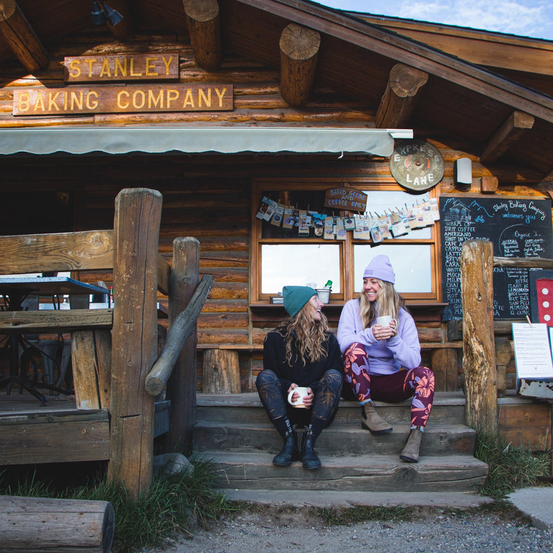 Women wearing merino wool leggings at cabin