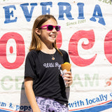 Girl wearing skylar jersey and eating ice cream
