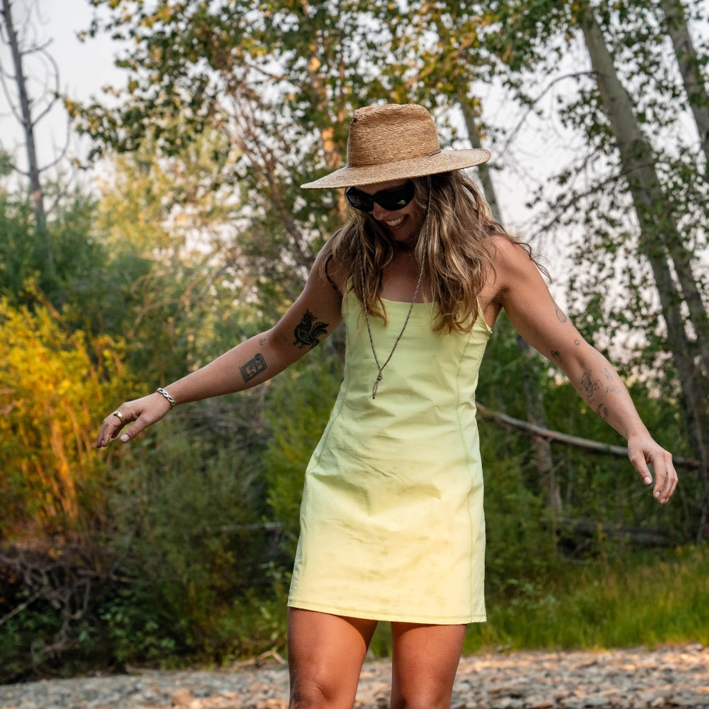 [Iced Matcha] woman walking on river rocks