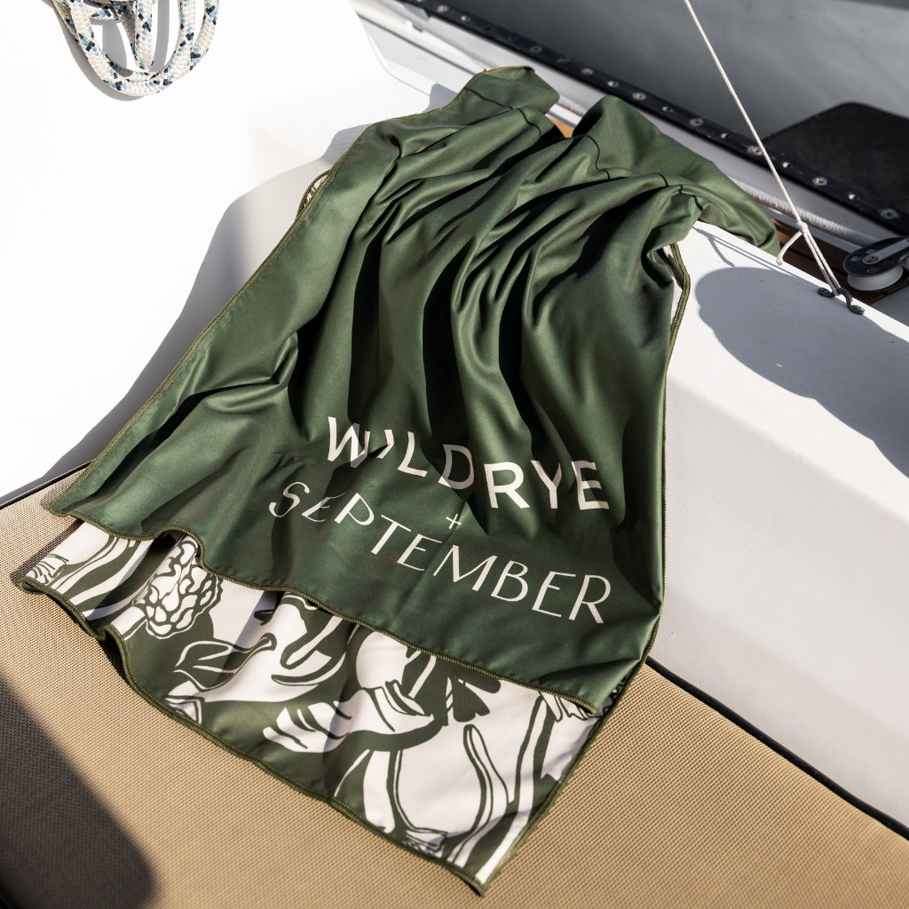 [WR x September] quick dry camp towel draped over side of sailboat