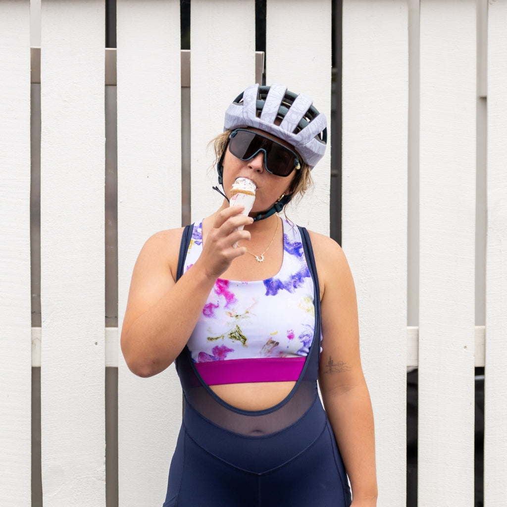 [Watercolor] Woman eating ice cream cone after bike ride