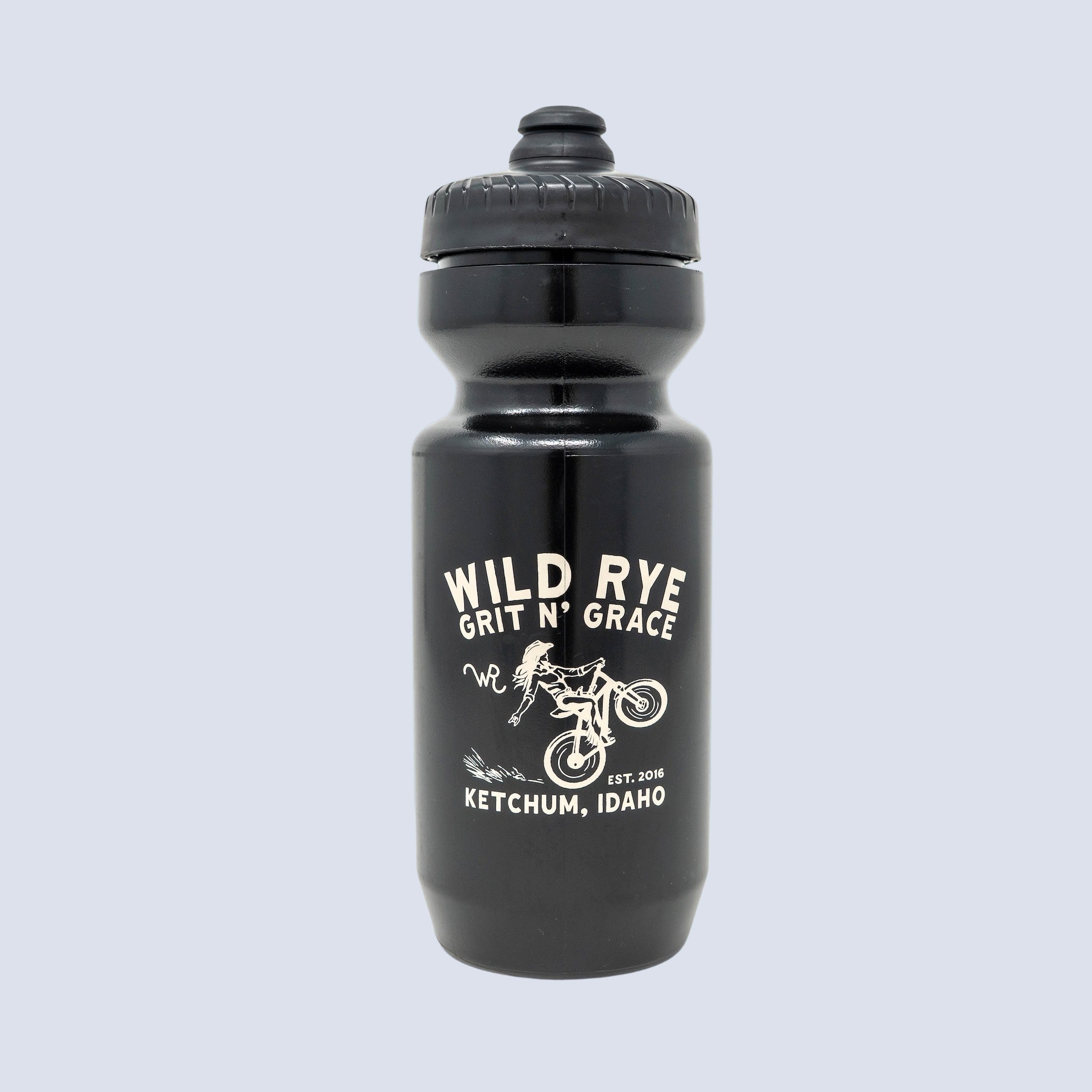 [Black Grit] Black bike water bottle with "wild rye, grit n' grace, ketchum idaho" and woman riding a bike design