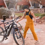 [Ochre] Woman Washing a Bike In Overalls