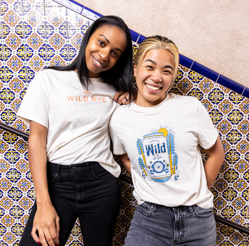 Two Models Wearing Wild Rye Graphic Tees
