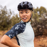Girl Wearing Gem Distance Jersey On Bike 