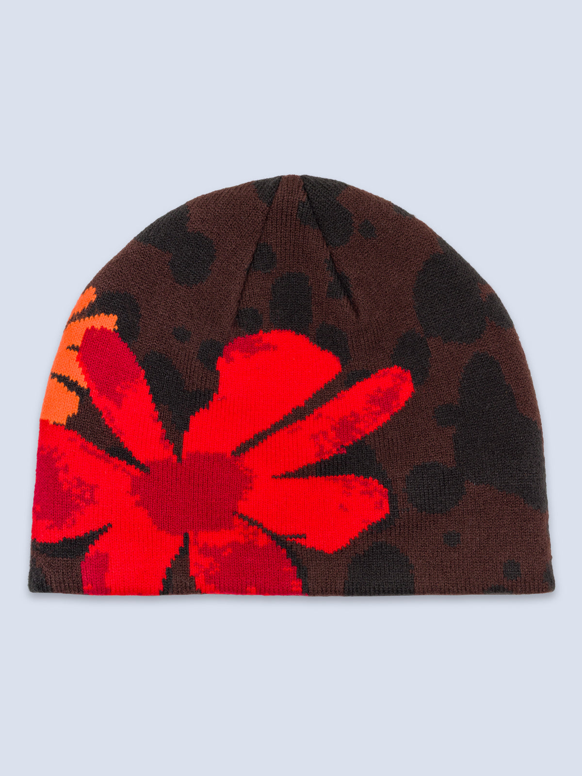 [Dapple] Brown and black printed beanie with a flower on it. Tamarack toque in dapple print