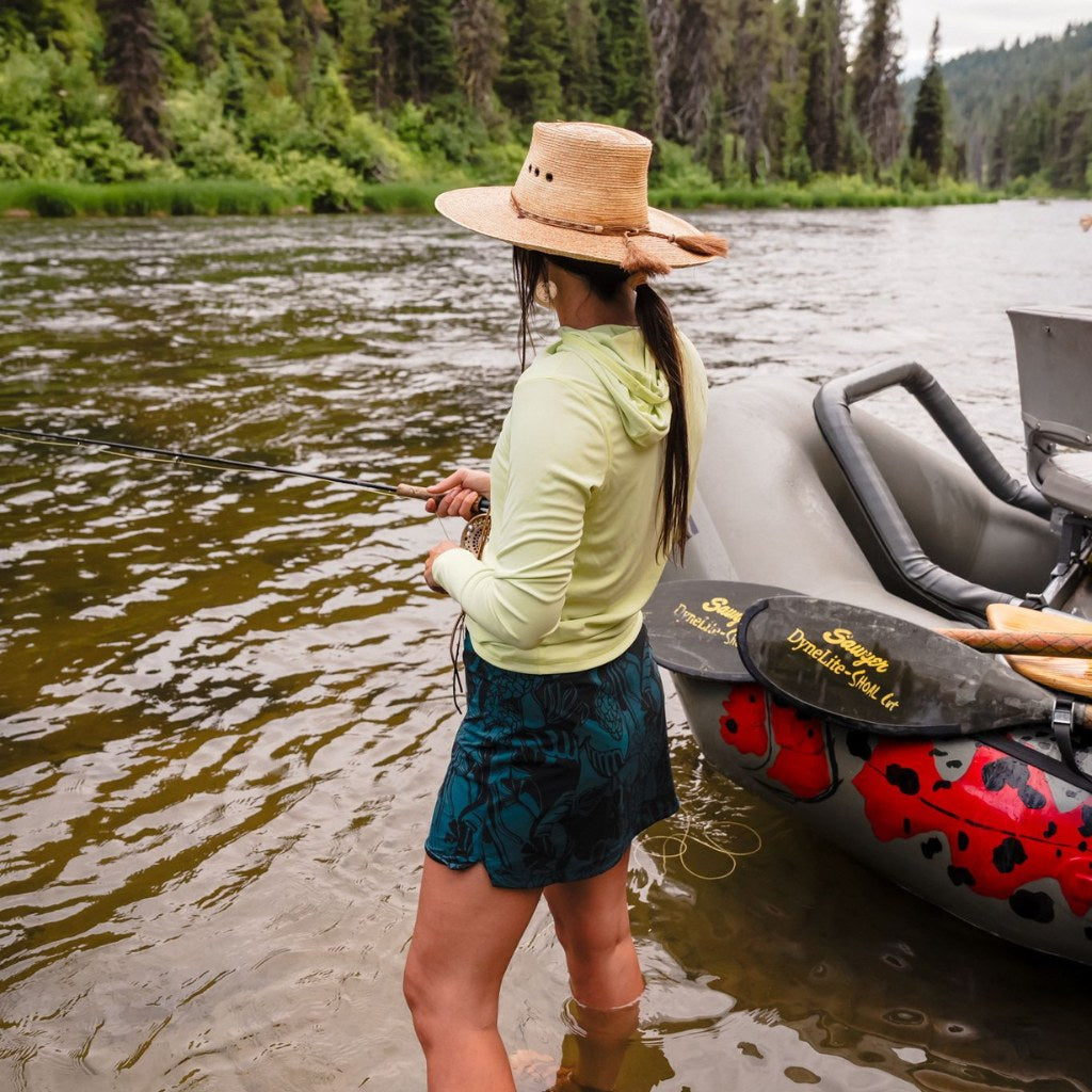 [Iced Matcha] woman fly fishing wearing the Sawyer Sunshirt Matcha 