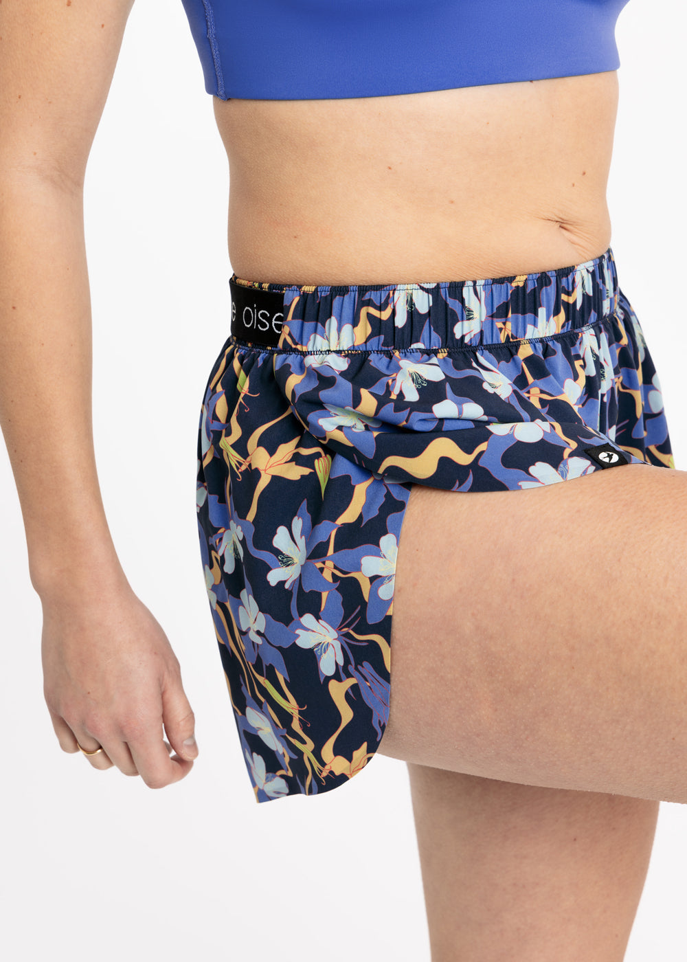 Split hem feature of floral shorts