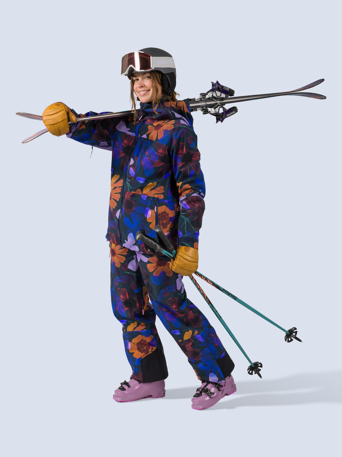 [Nightflora] Butterfield 3L Jacket in nightflora floral print, on model with skis shot