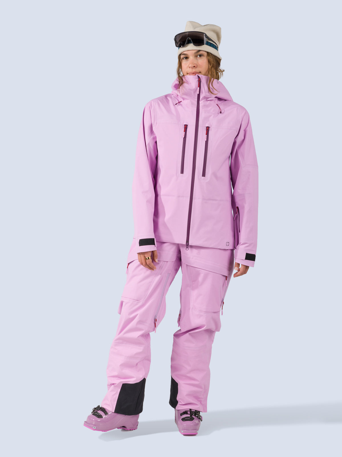[Orchid] Heyburn 3L Bib in orchid pink, styled with the Heyburn 3L Jacket, on model front full body view