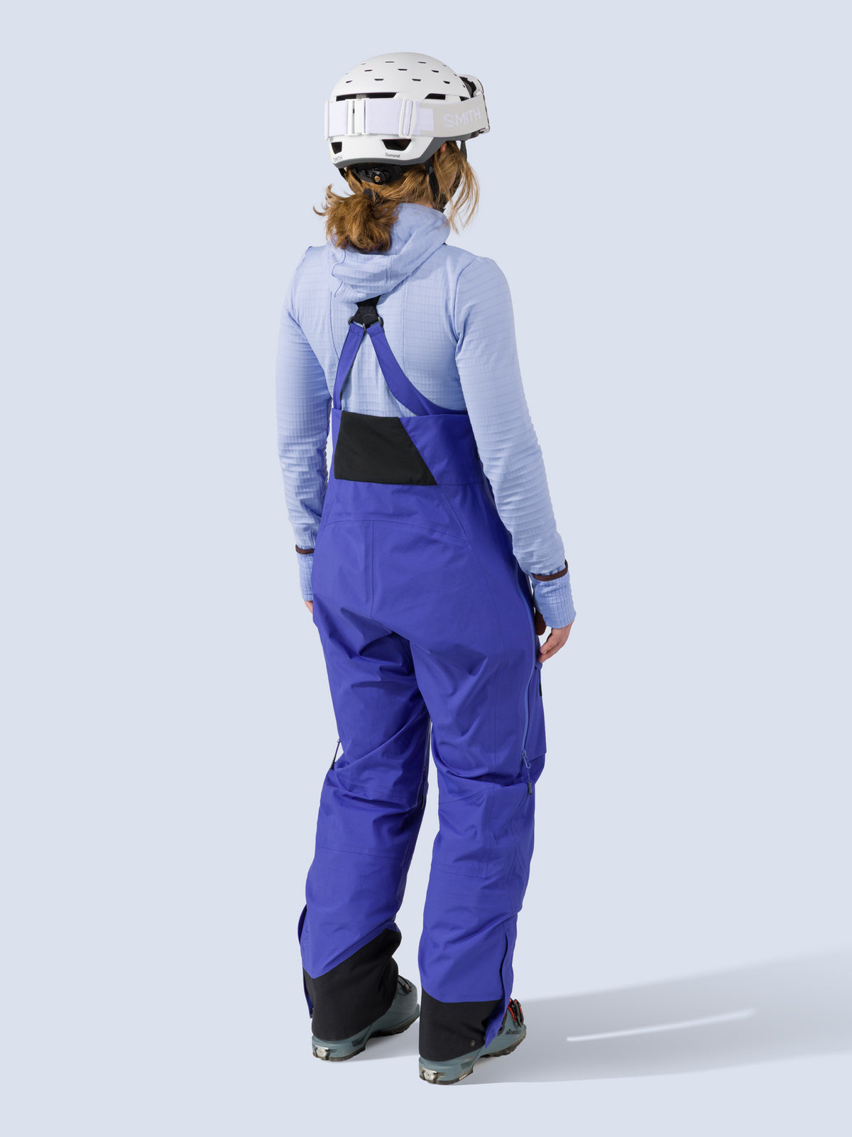 [Lapis] Heyburn 3L Bib in lapis blue, on model back full body view