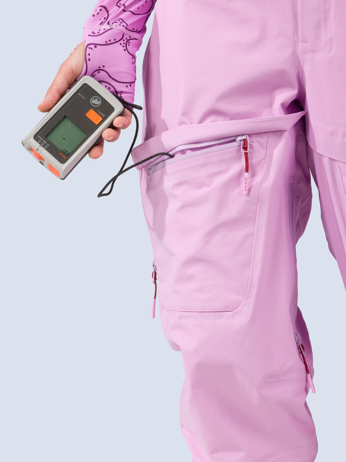 [Orchid] Heyburn 3L Bib in orchid pink, thigh pocket with avalanche beacon detail
