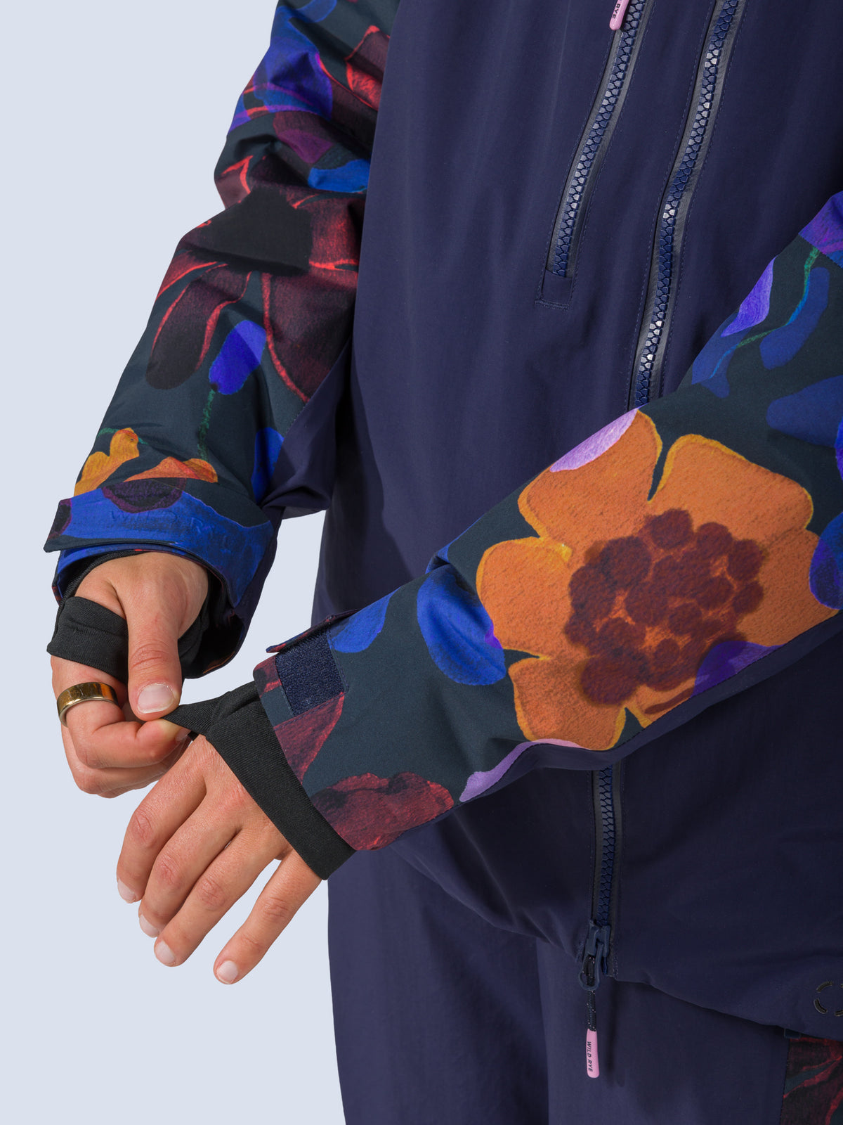 [Nightflora] Roundhouse 2L Insulated Jacket in nightflora floral print, wrist gaiter thumbhole detail