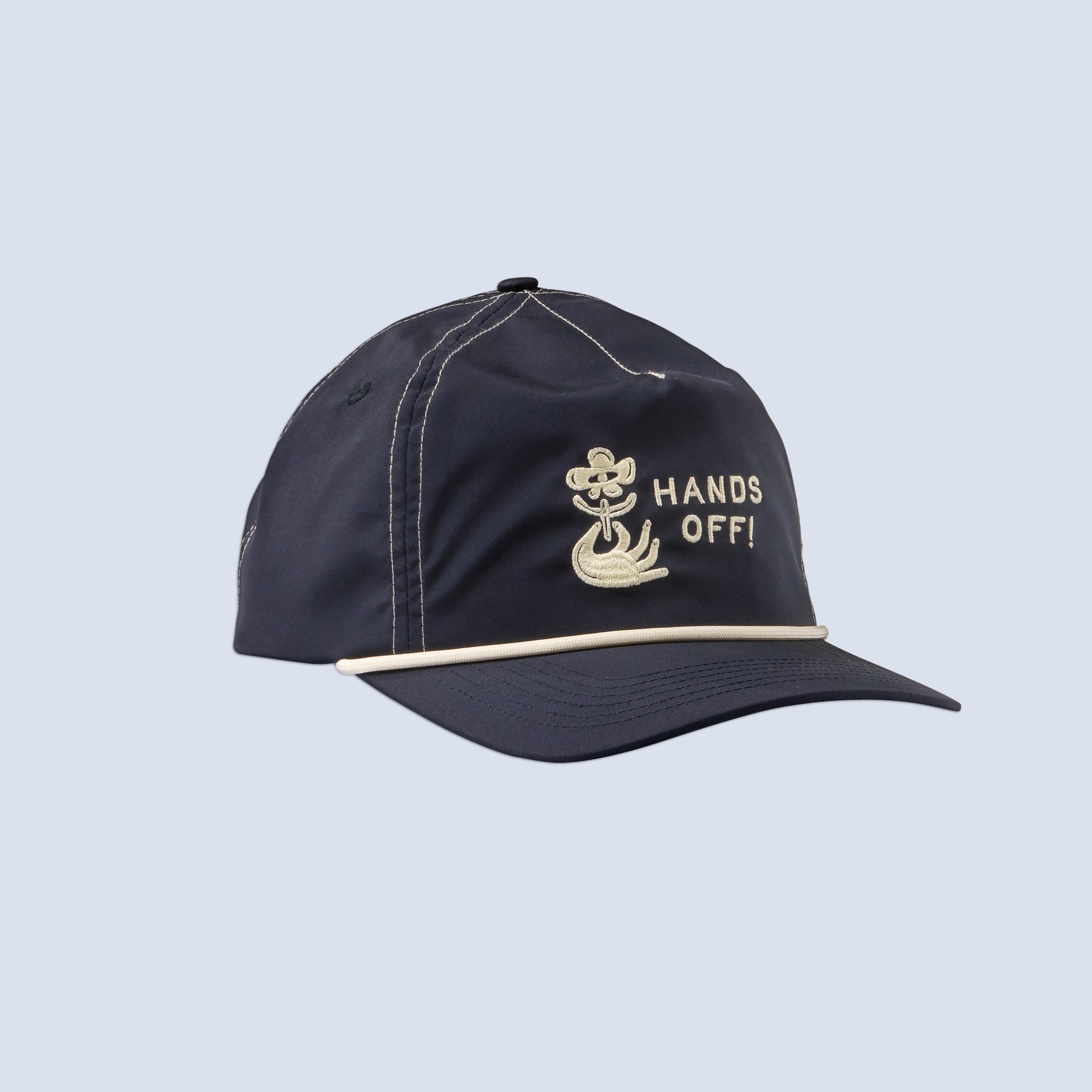 Navy blue trucker hat with 'HANDS OFF!' text and flower design 