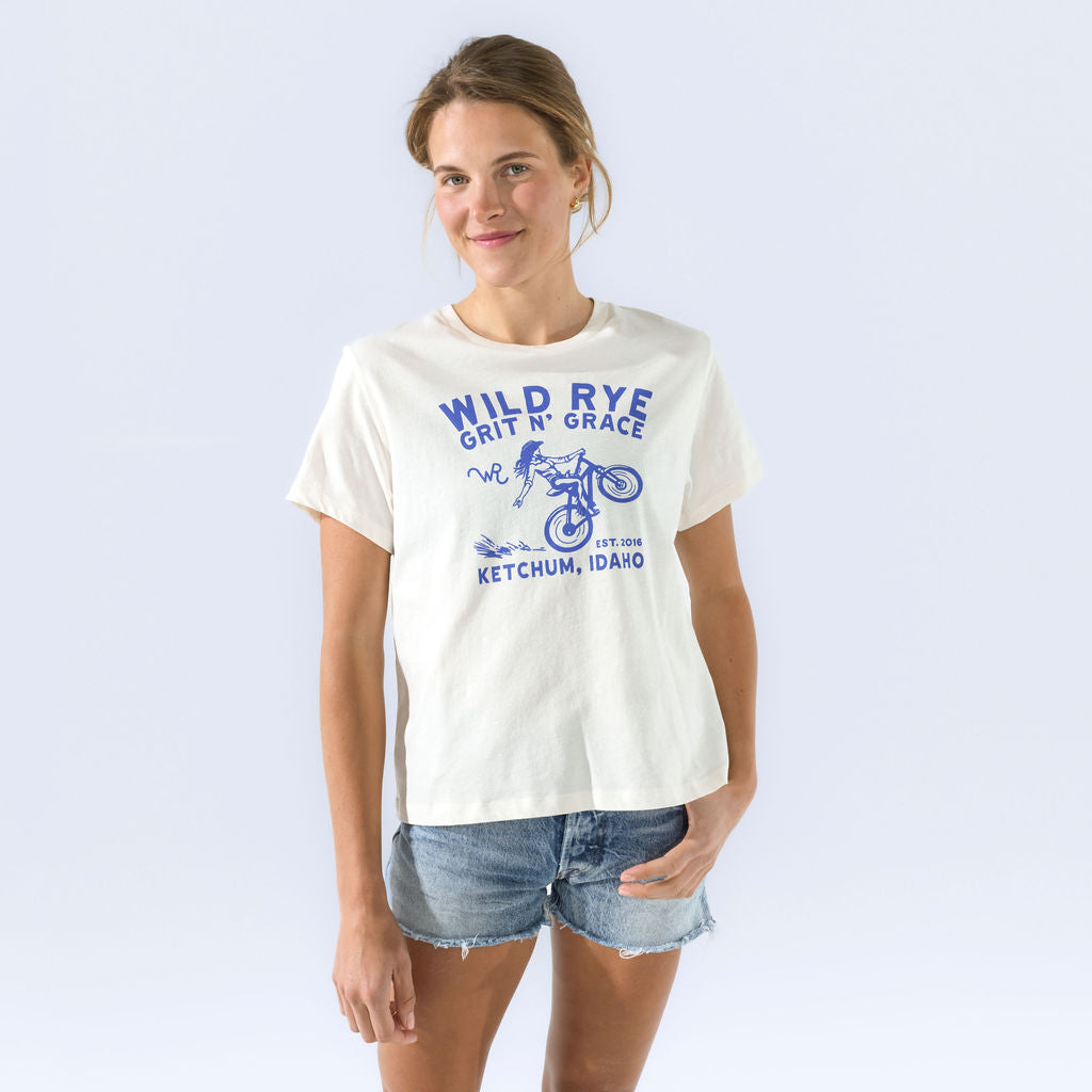 [Bluebell Grit] [Black Grit] Wild Rye Grit n Grace graphic tee in white, worn on model with shorts, crop view