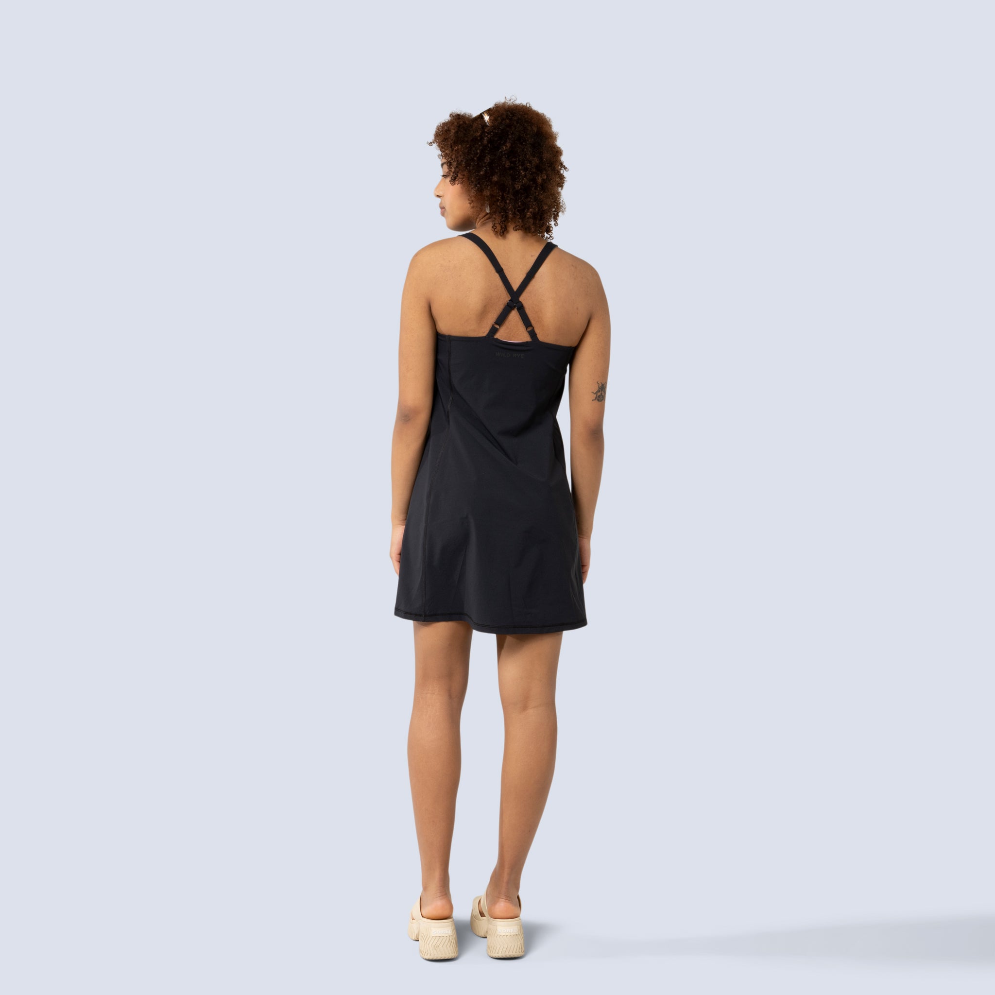 [Black] Parker Dress in Black, on model back full body view