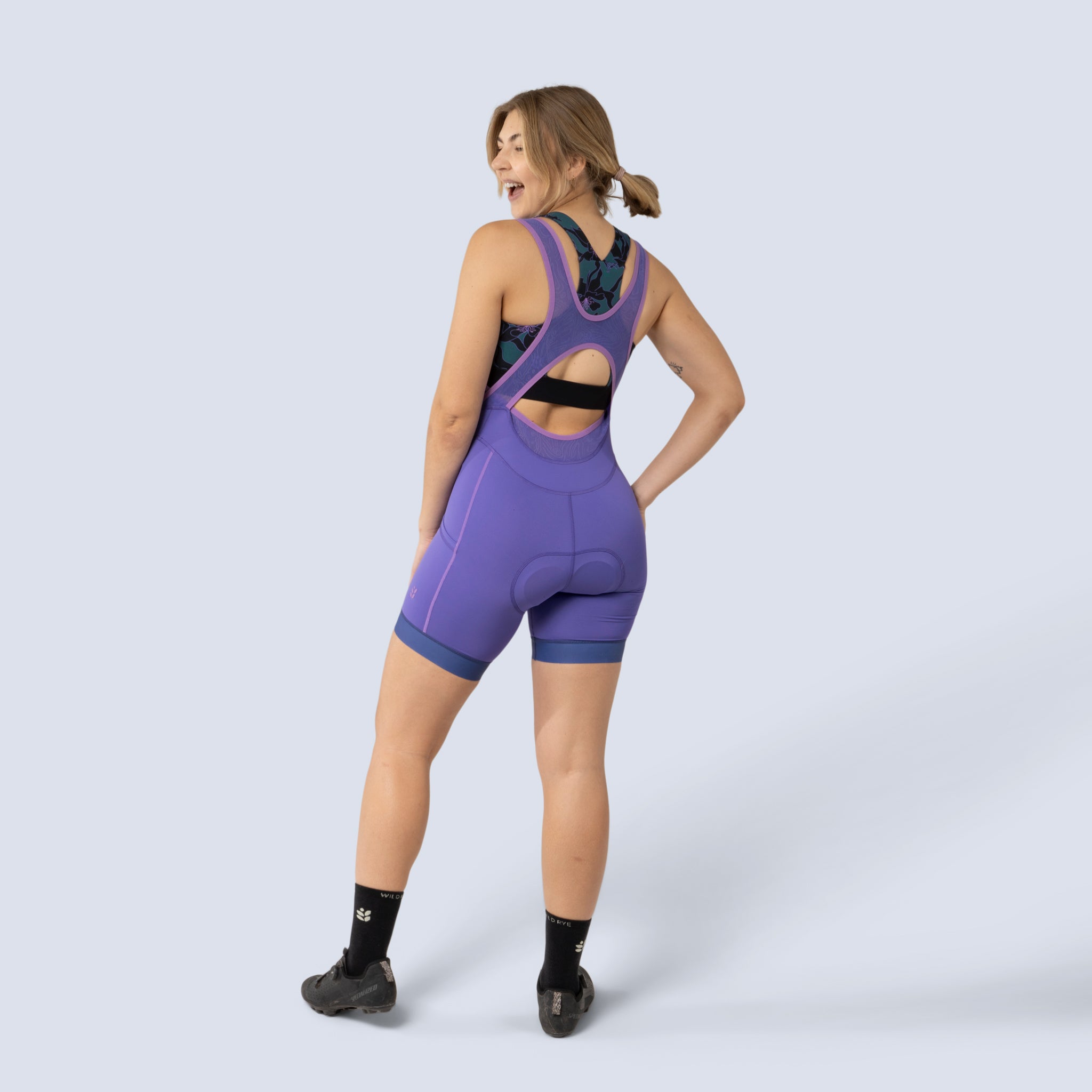 [Iris] Billie Stash Bib in Iris, on model back full body view
