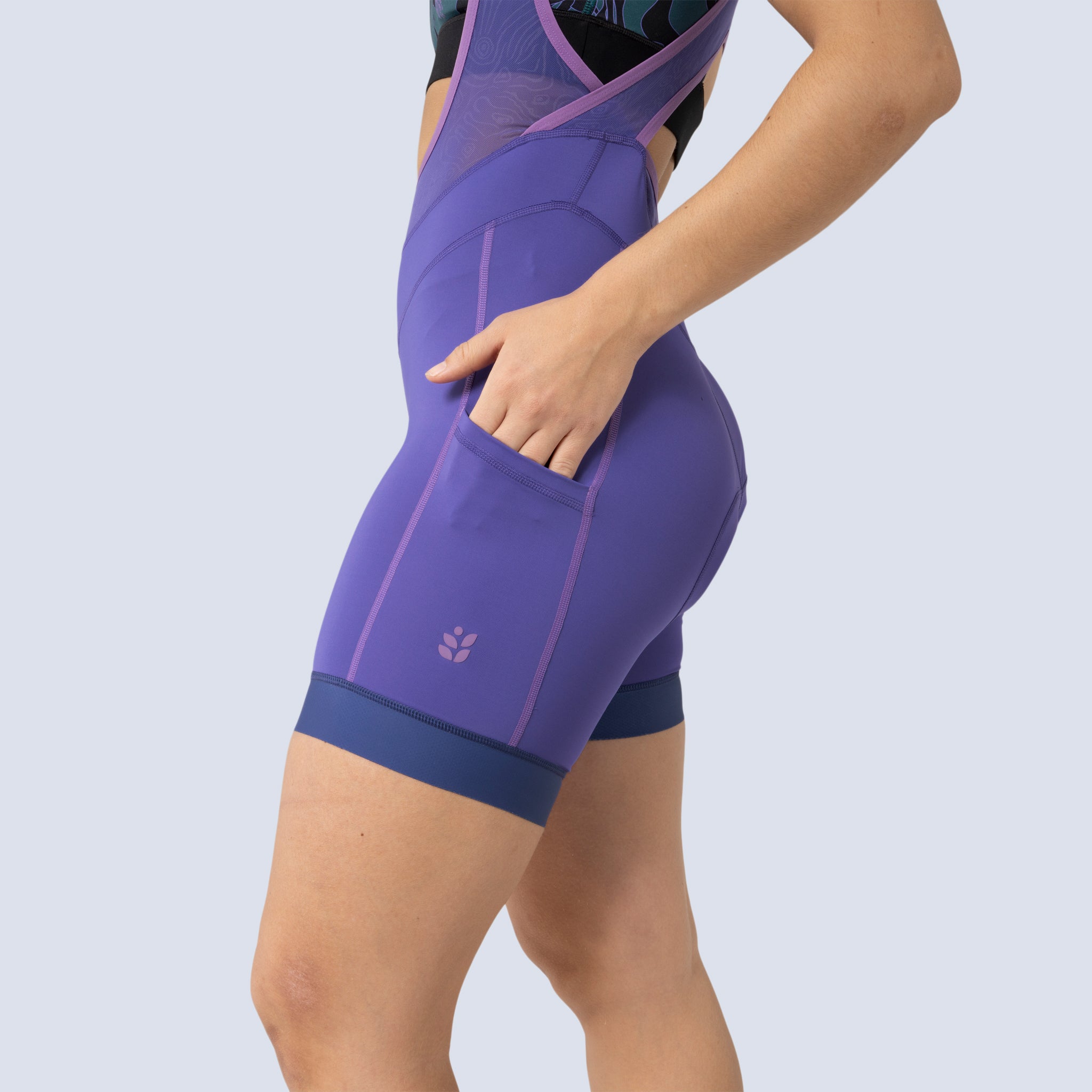 [Iris] Billie Stash Bib in Iris, side pocket detail