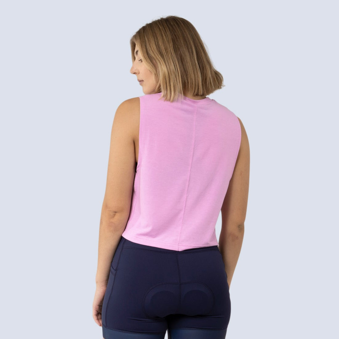 [Alpenglow] Keller Crop Tank Alpenglow Pink on model back crop view