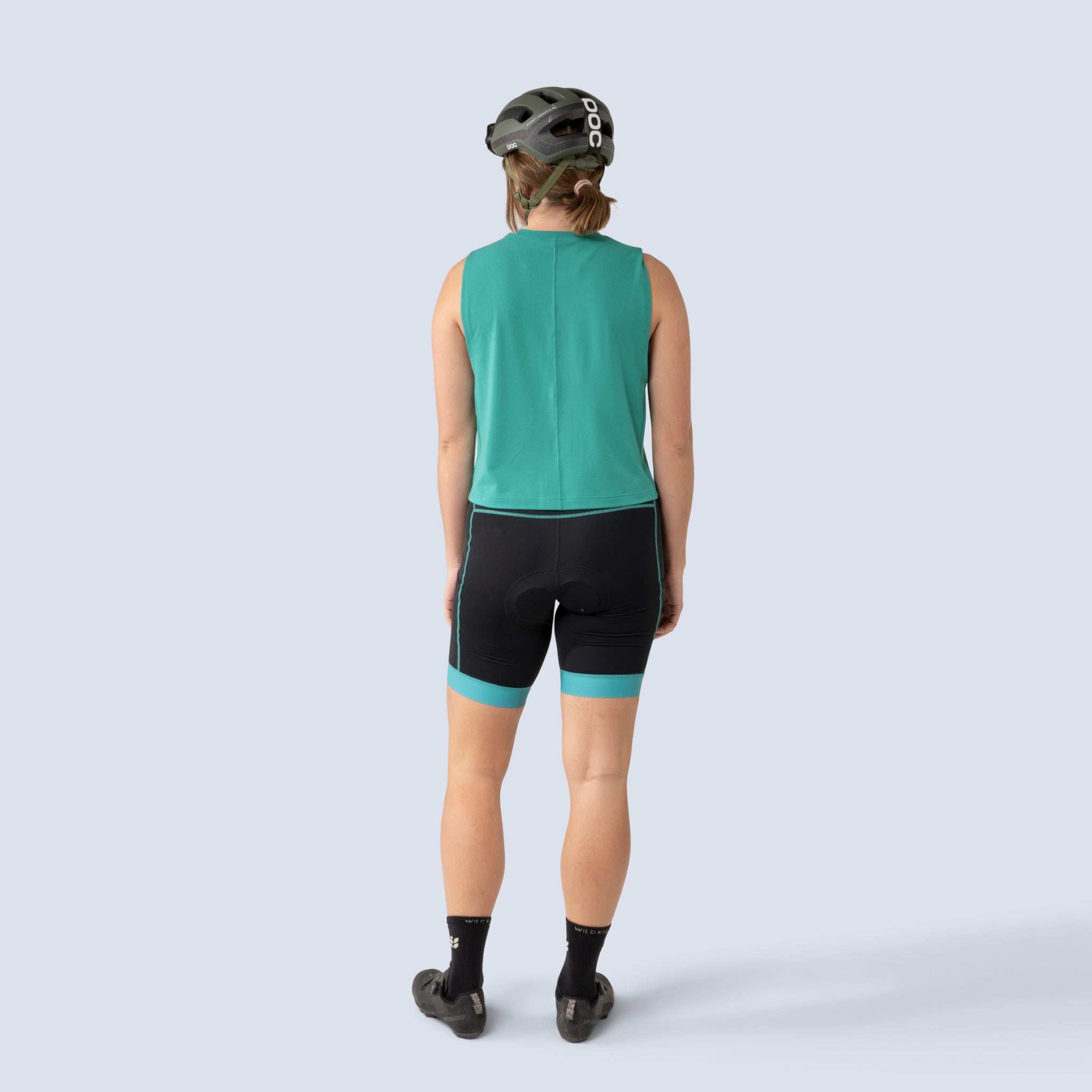 [Black Alhambra Blocked] Alyssa Chammy bike shorts in black with green leg bands, on model back full body view