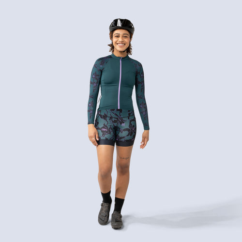 [Spruce Aquila Bloom] Eleanor Chammy in green with black floral print, on model front full body view