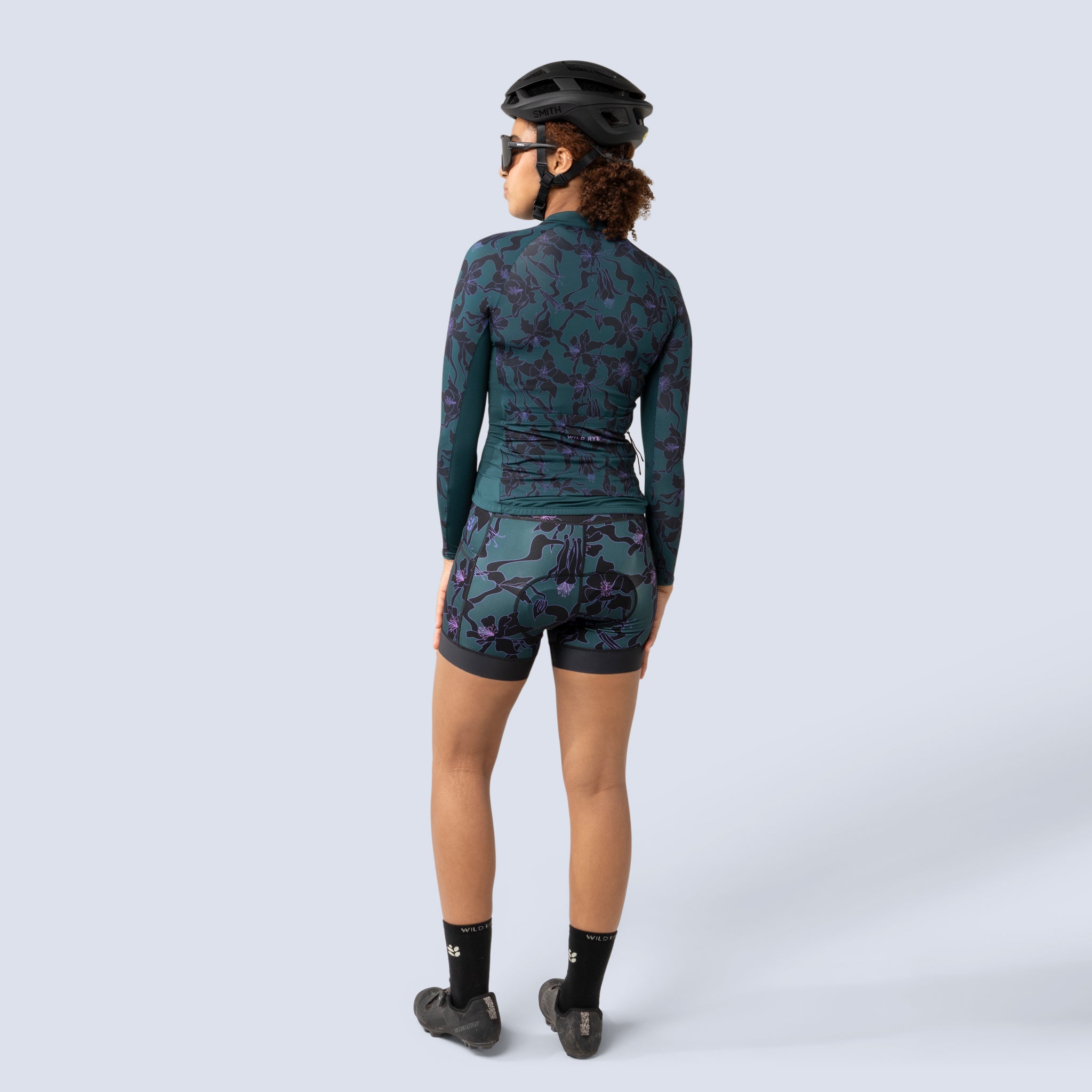 [Spruce Aquila Bloom] Eleanor Chammy in green with black floral print, on model back full body view