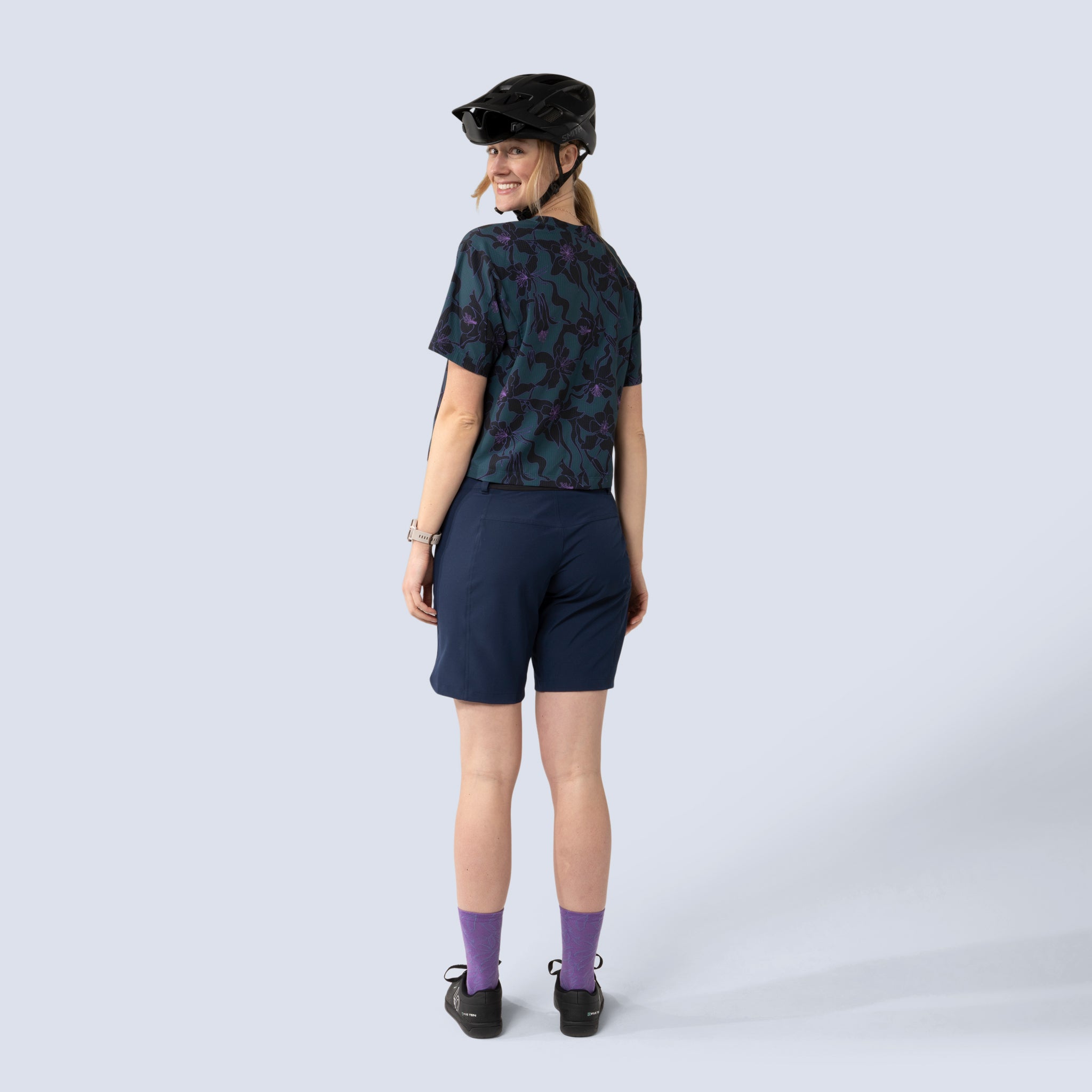 [Spruce Aquila Bloom] Easley Crop tee black and green floral, on model back full body view
