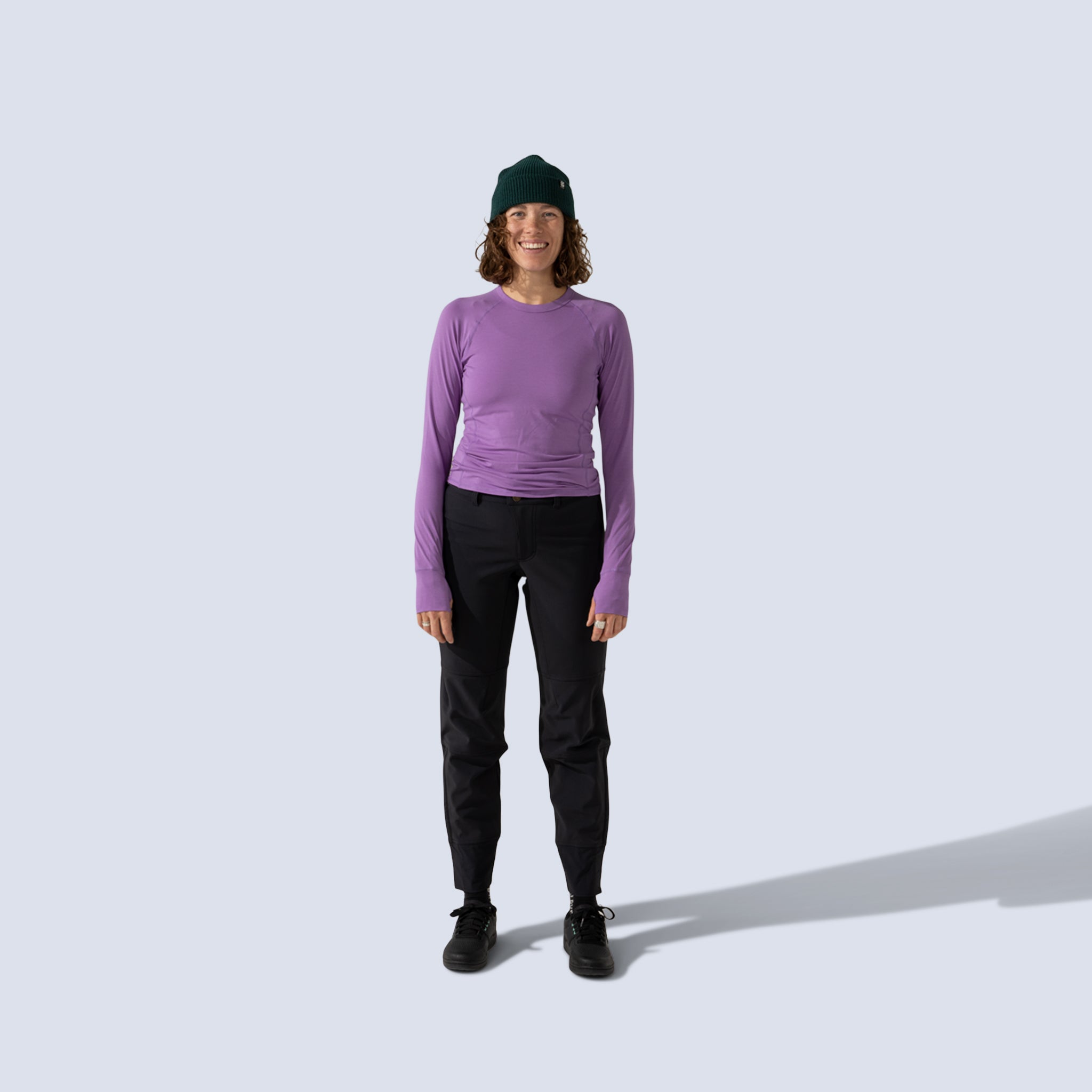 [Amethyst] Bassett Raglan Lite amethyst purple on model front full body view with bike pants