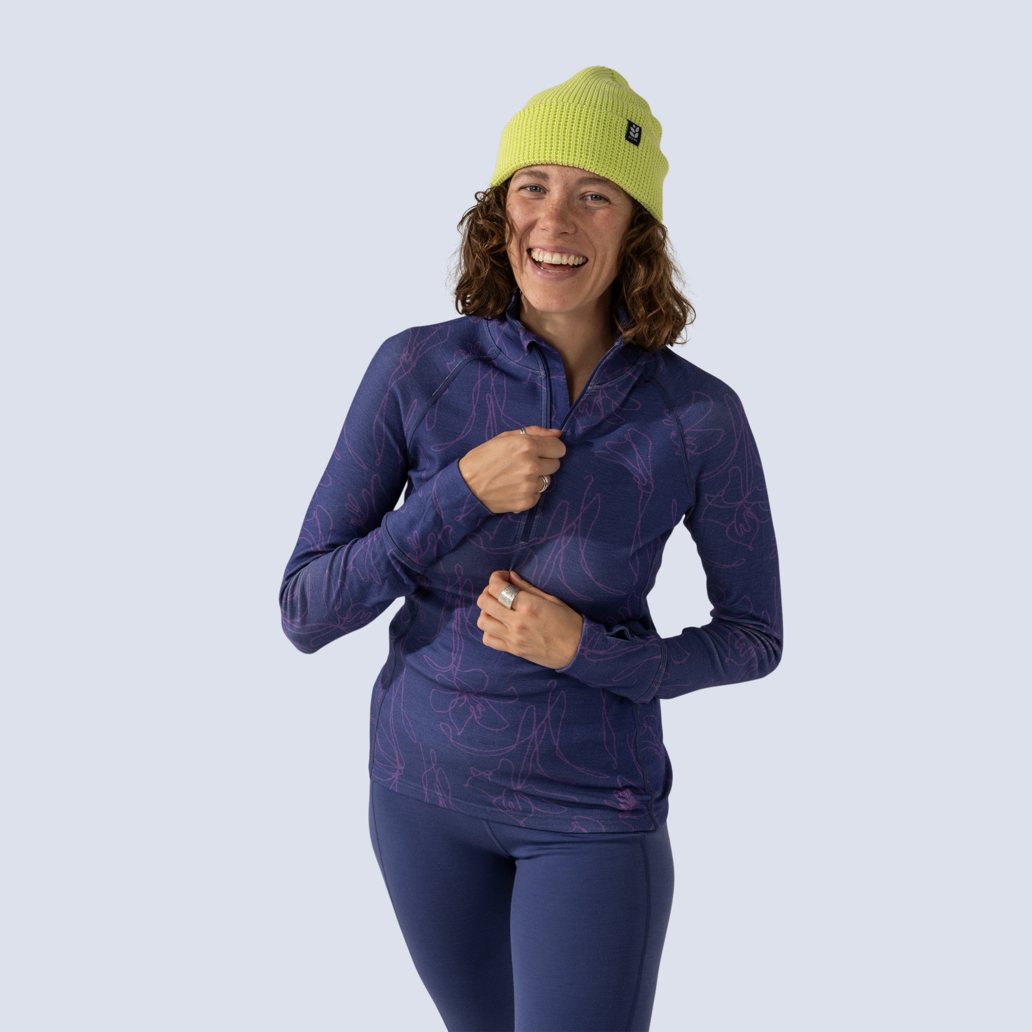 [Iced Matcha] Woman smiling wearing iced matcha green knit beanie