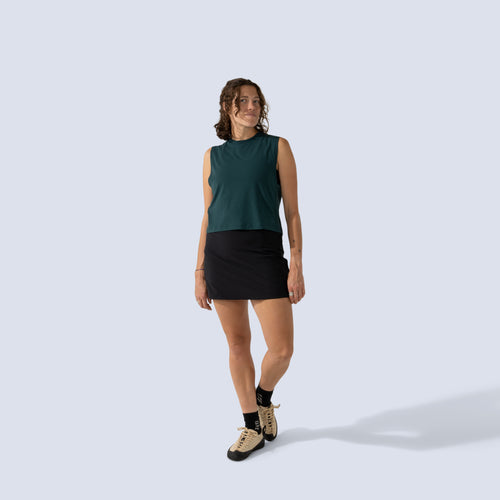 [Black] Parker Skort Black front full body, paired with green tank top