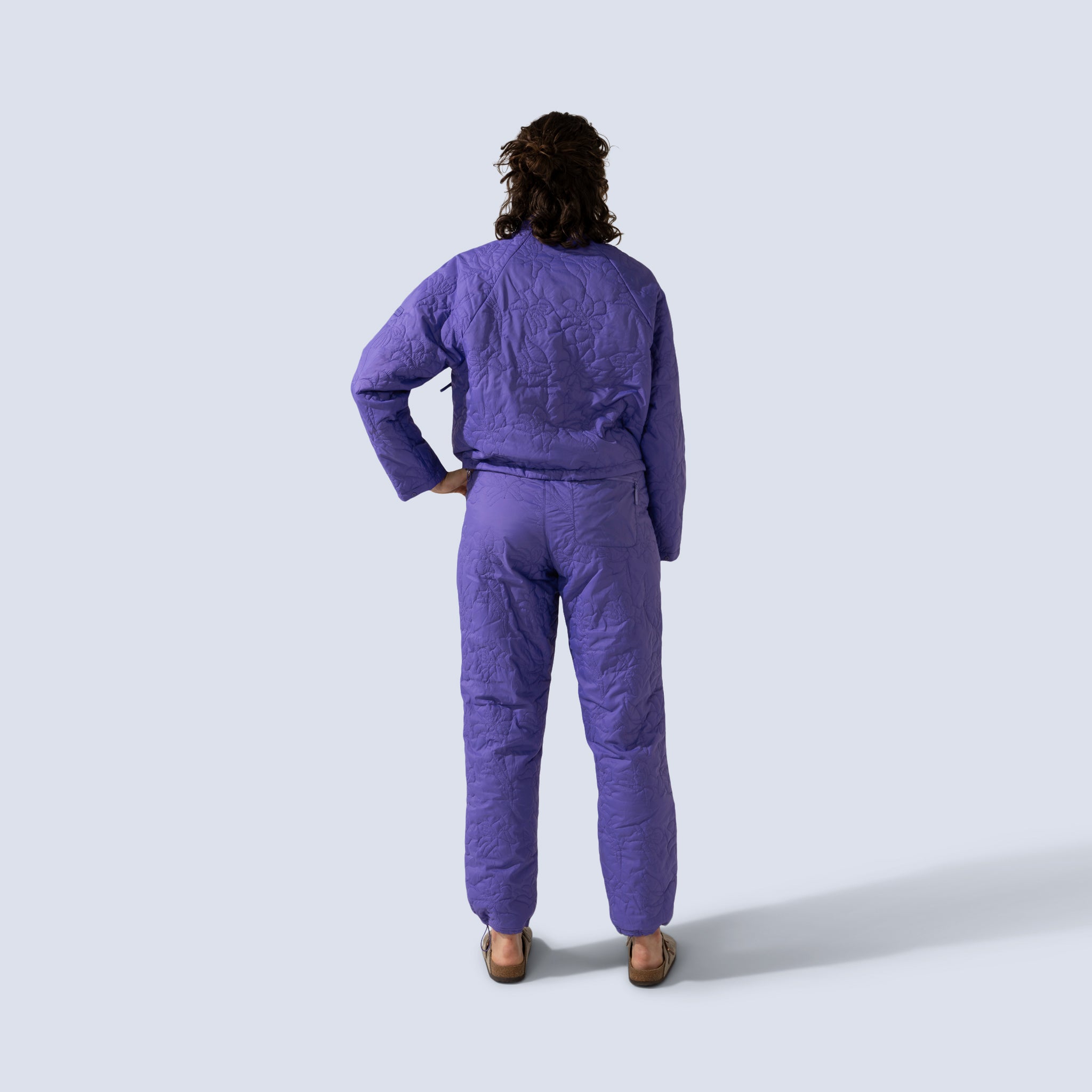 [Iris] Payette Insulated Pant in Iris purple, on model back full body view