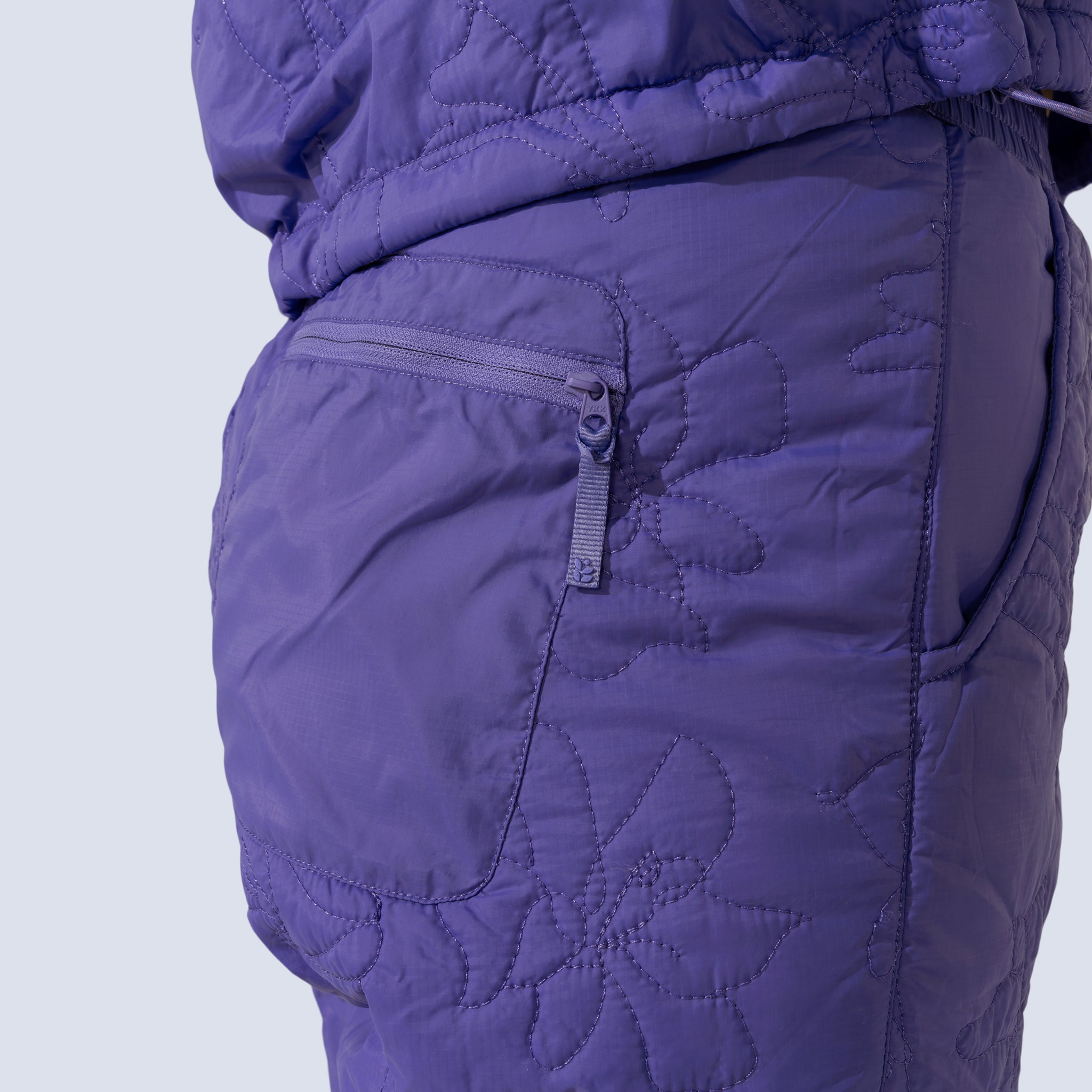 [Iris] Payette Insulated Pant in Iris purple, back pocket zipper detail