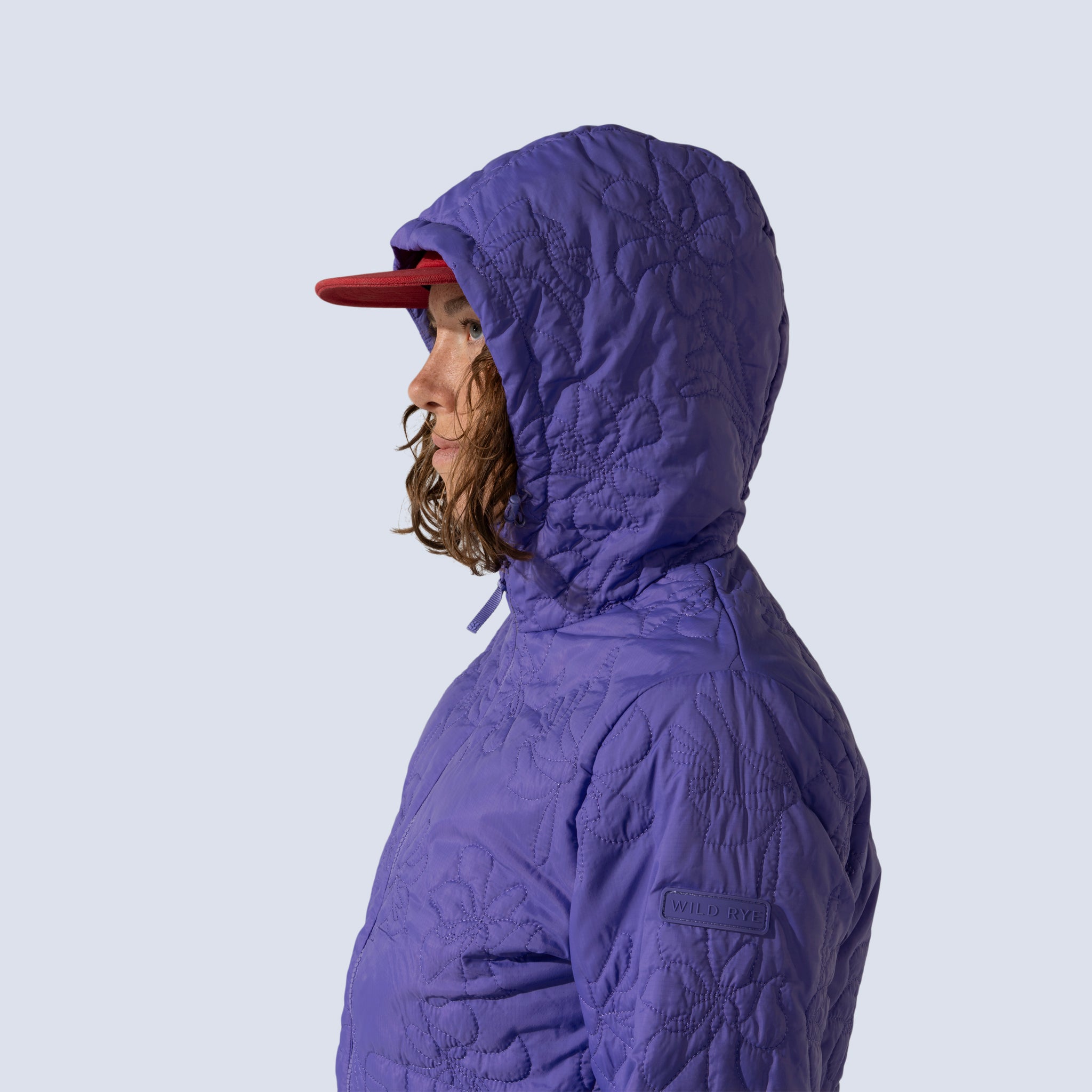 [Iris] Payette insulated jacket in iris purple, on model hood up detail