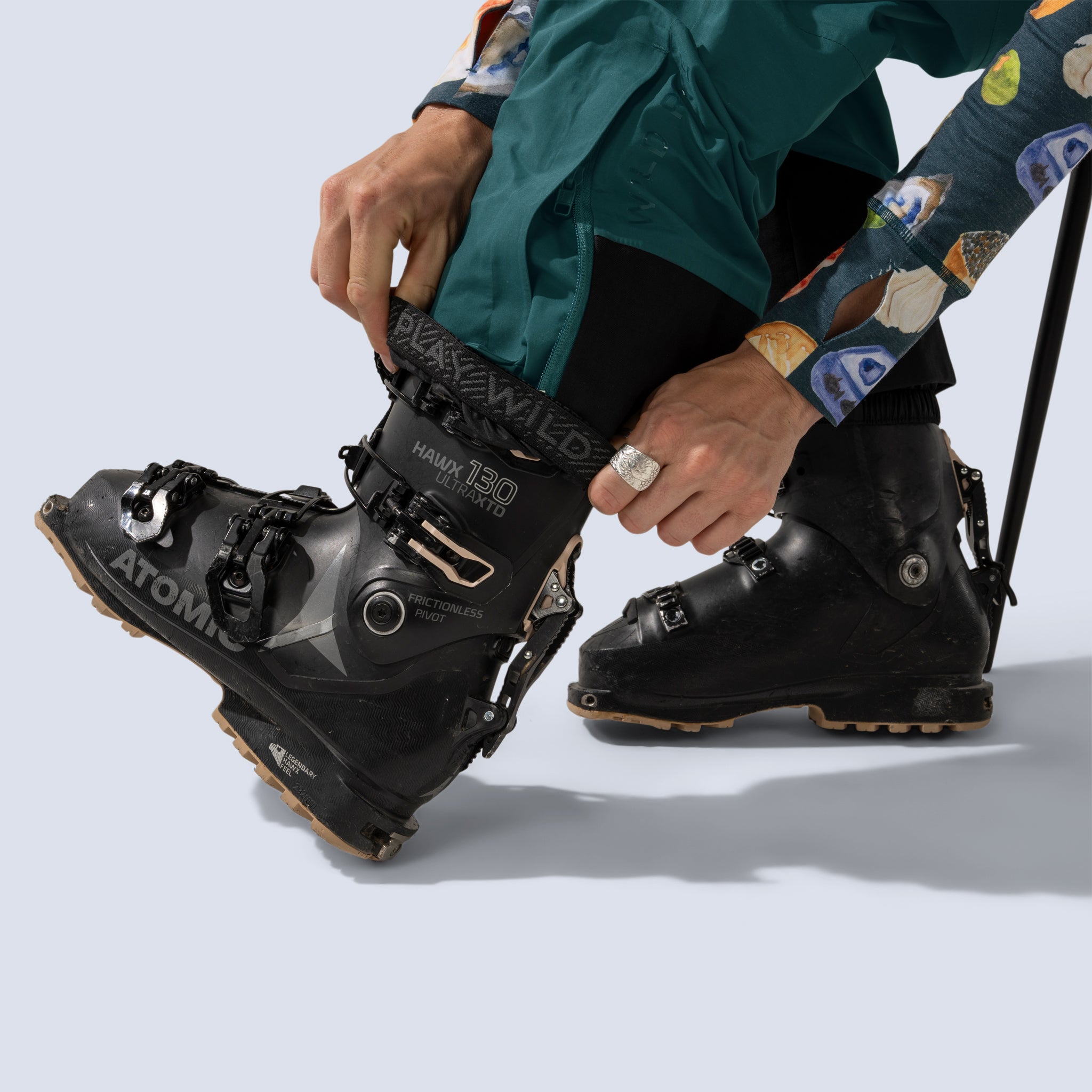 [Shaded Spruce] Heyburn 3l bibs in shaded spruce, "play wild" text on snow gaiter