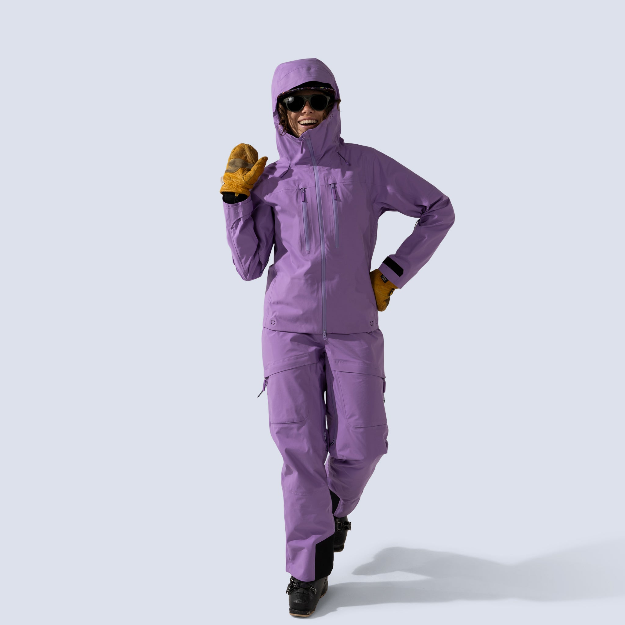 [Amethyst] Heyburn 3L Jacket in amethyst, model waving to camera