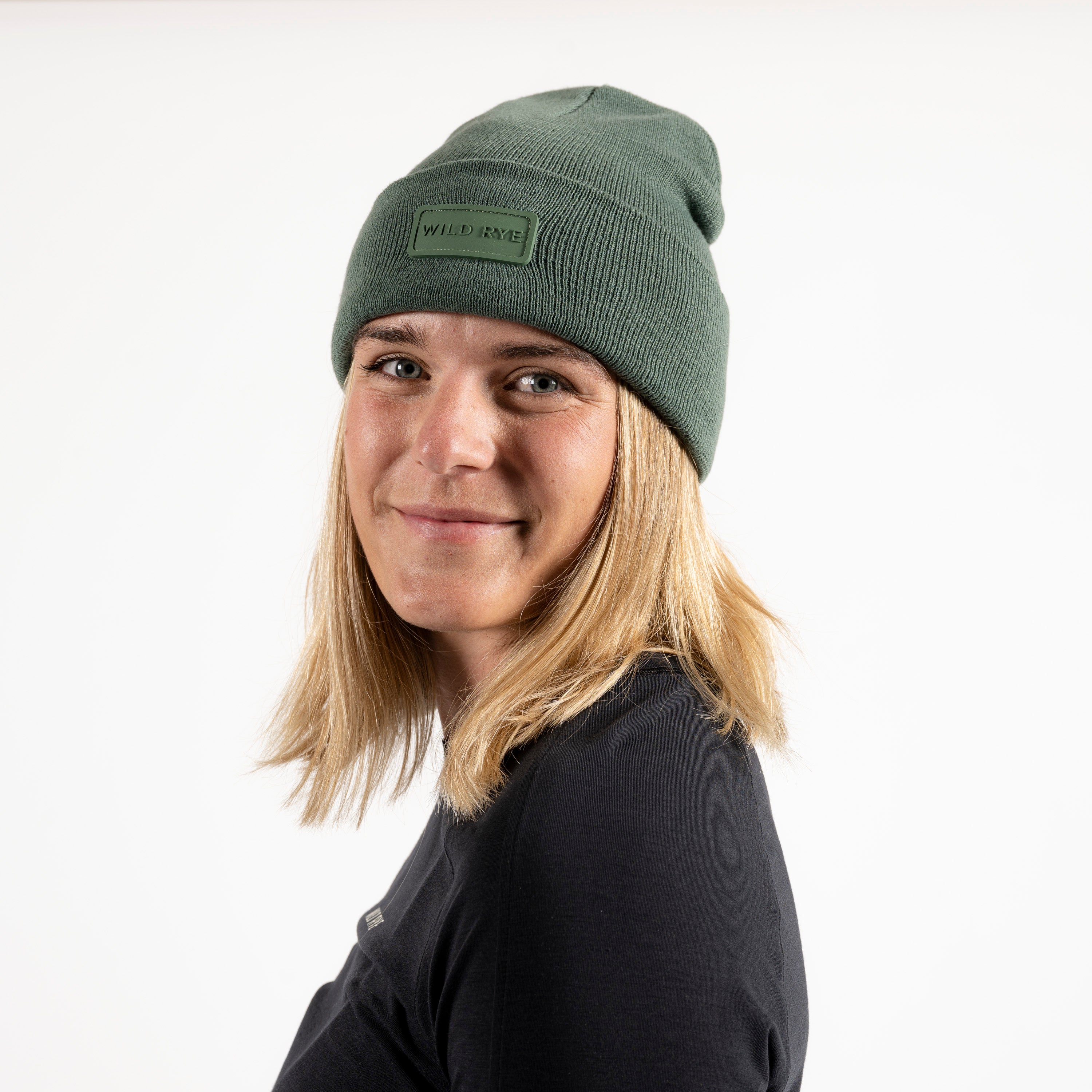 [Slate Green] Woman wearing gretzki knit beanie in slate