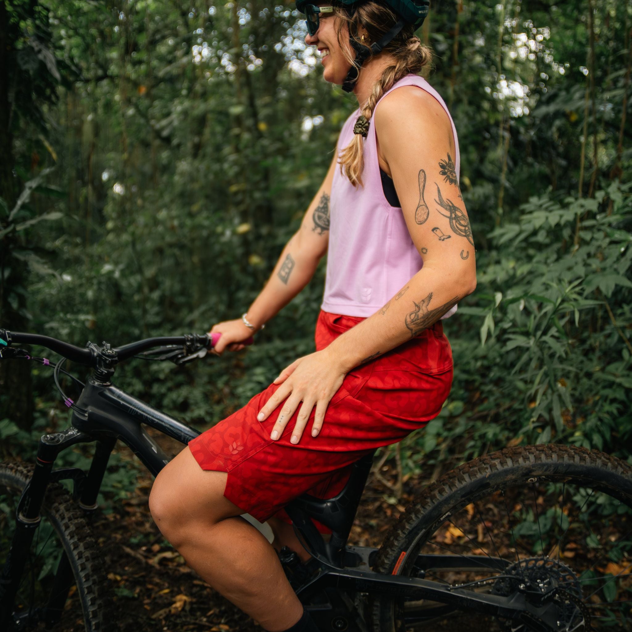 [Garnet Meow] Person sitting on a bicycle in a forest setting