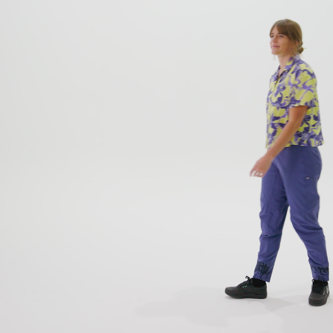 Video showing a model walking into the frame wearing a lil party shirt
