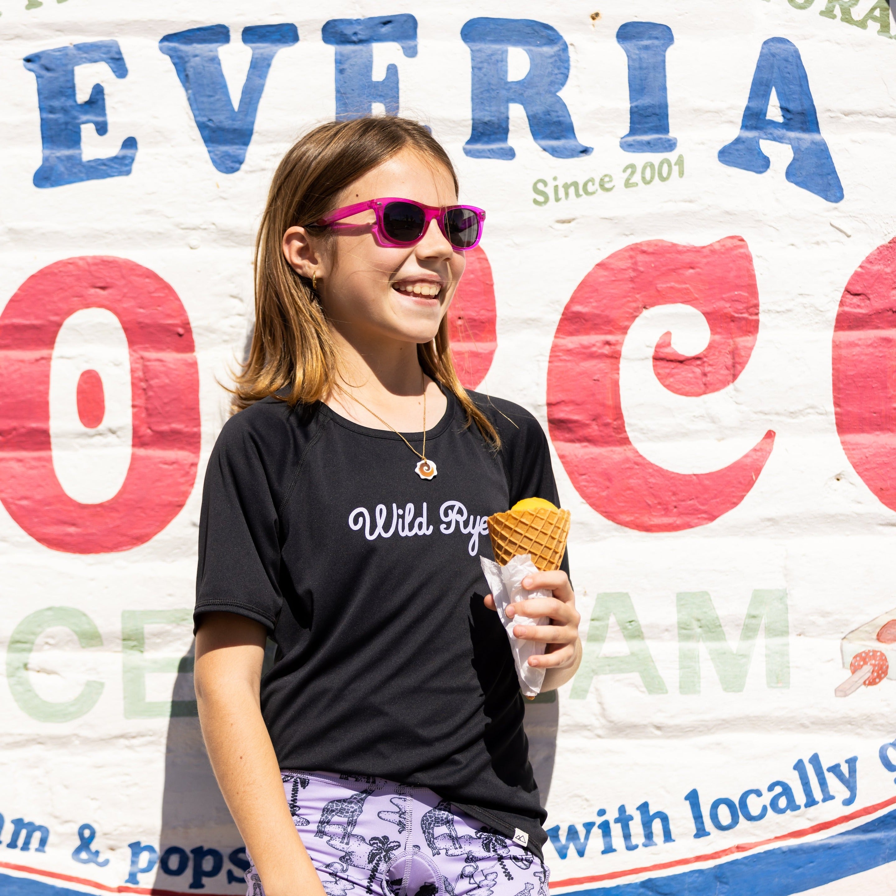 [Black] Girl wearing skylar jersey and eating ice cream